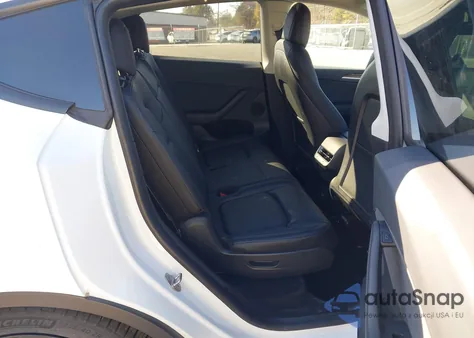 2023 Tesla Model Y Awd/Long Range Dual Motor All-Wheel Drive from USA, damaged, VIN 7SAYGAEE6PF637708